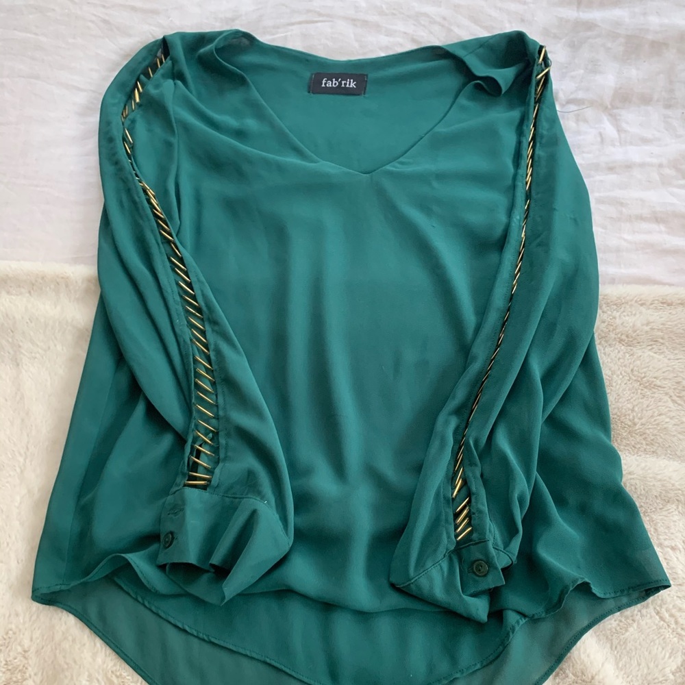 Green blouse.